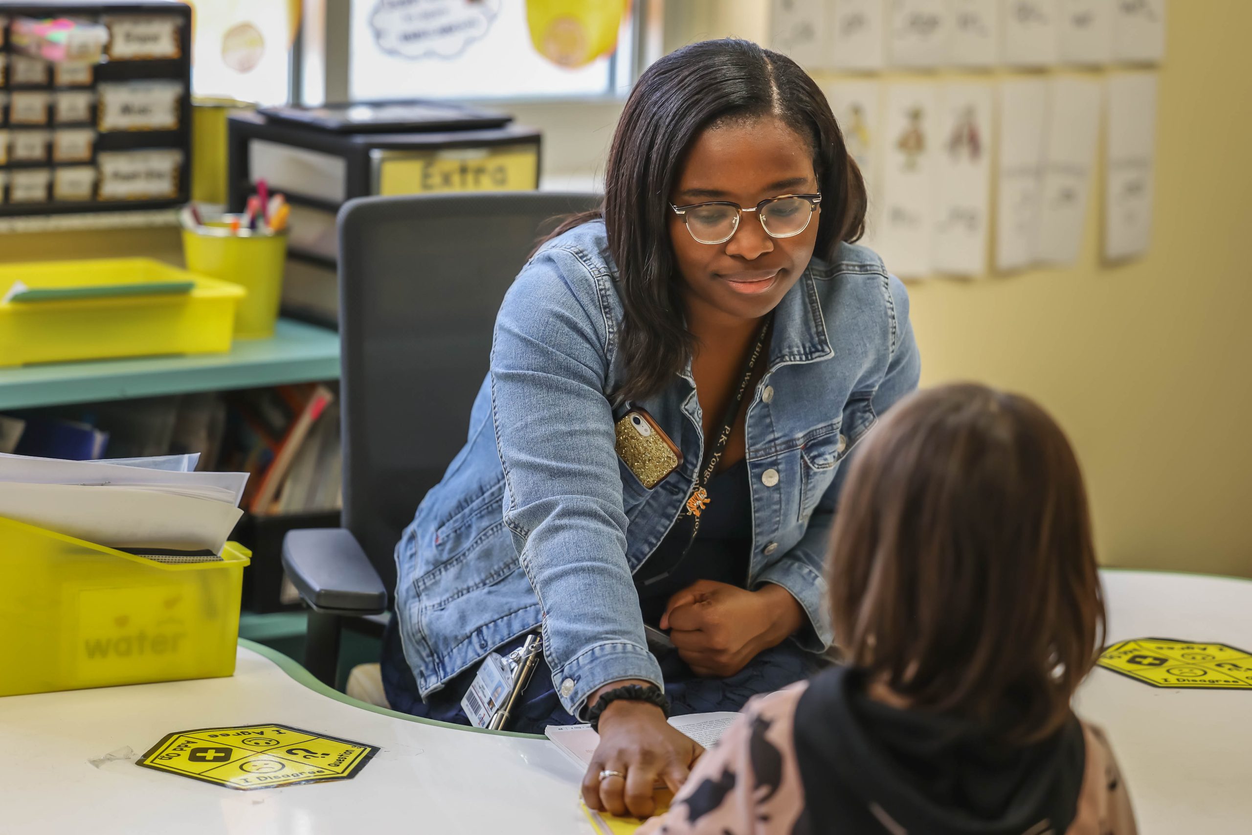 Young tutor with young student