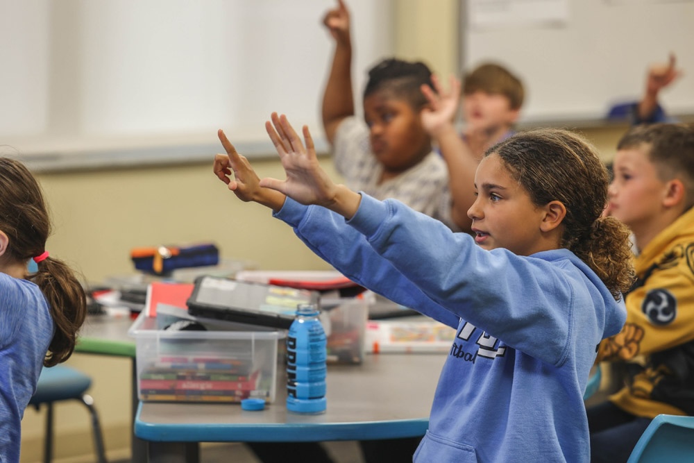 students counting on fingers